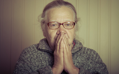 Portrait of elderly woman in glasses. Toned.の写真素材
