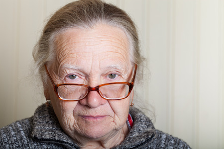Portrait of elderly woman in glasses.の写真素材