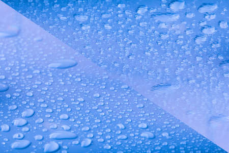 Drops of water on a color background. Blue. Shallow depth of field. Selective focus. Collage. Toned.