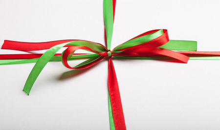 Satin bow on a cardboard box for cake. Selective focus. Shallow depth of field.の写真素材