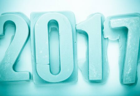 Happy New Year 2017 on white bacground. Figures of mastic or concrete. Toned.の写真素材