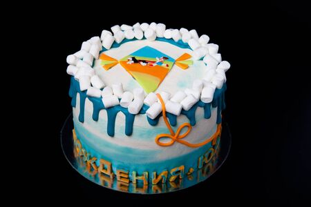 Birthday cake with inscription Happy birthday, Juliana on blue background.