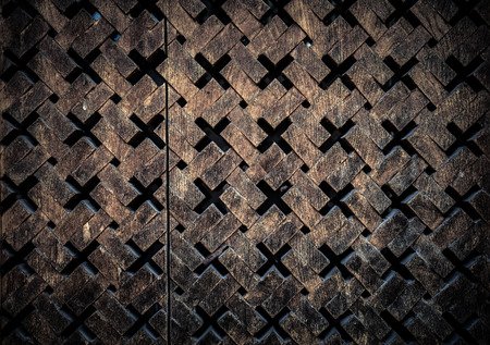 Carved wooden surface. Textured background. Toned.の写真素材