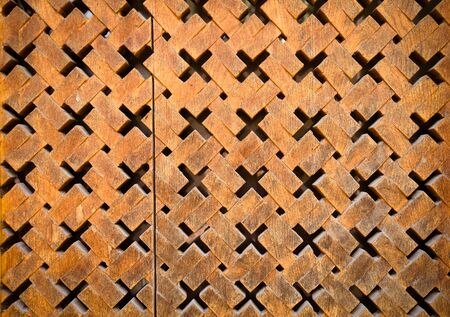 Carved wooden surface. Textured background. Toned.の写真素材