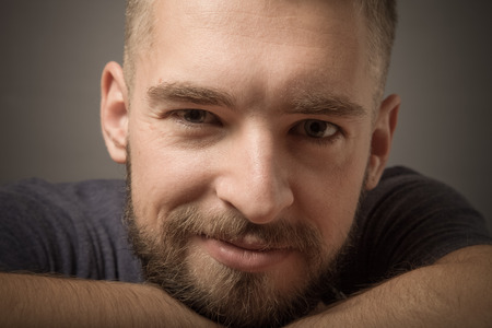 Portrait of a young man with a beard. Toned.の写真素材