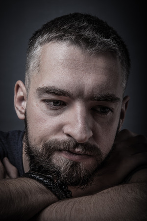 Portrait of a young man with a beard. Toned.の写真素材
