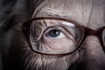 Portrait of elderly woman with glasses. Toned.の写真素材