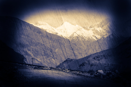 Hilly landscape in the Tajikistan. Fantasy art processing of photos with black frame for a collage. Toned.の写真素材