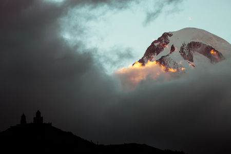 Beautiful sunrise in Stepancminda, Georgia. View to the Kazbek mountain. Toned.