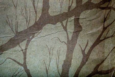 Surface of old paper for textured background. Toned.