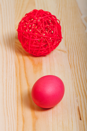Easter symbols - colored eggs on light background.の写真素材