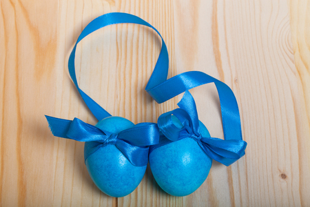 Easter composition on light wooden background.の写真素材