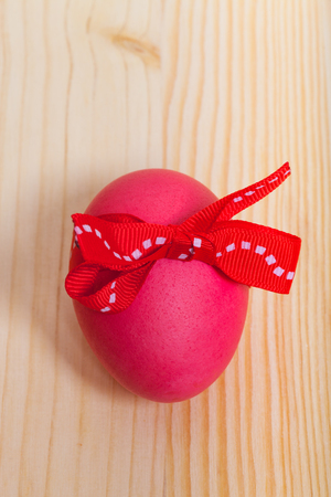 Easter symbols - colored eggs on light background.の写真素材