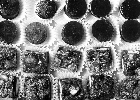 Set of different kinds of natural desserts in a carton box. Toned.の写真素材