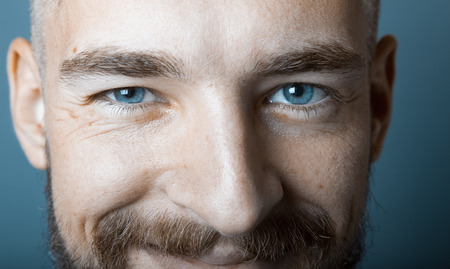 Portrait of a young man with a beard. Toned.