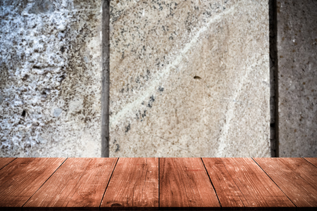 Surface of the stone for natural background. View from dark wooden gangway, table or bridge. Collage. Toned.の写真素材