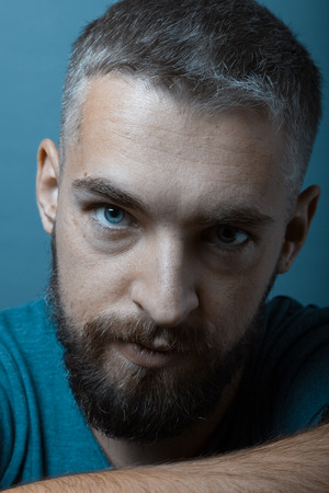 Portrait of a young man with a beard. Toned.の写真素材
