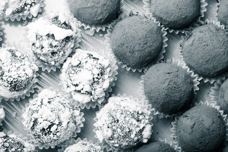 Set of different kinds of homemade chocolate truffles. Toned.の写真素材