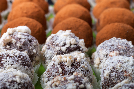 Set of different kinds of homemade chocolate truffles. Selective focus. Shallow depth of field.の写真素材