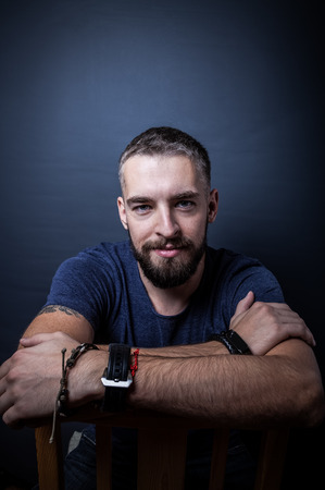 Portrait of a young man with a beard. Toned.の写真素材