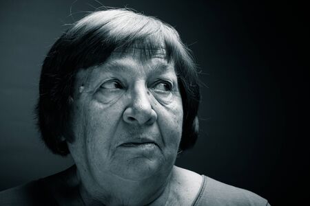 Portrait of elderly woman. Wonder. Toned.の写真素材