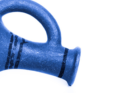 Empty ceramic jag on a white background. Toned.の写真素材