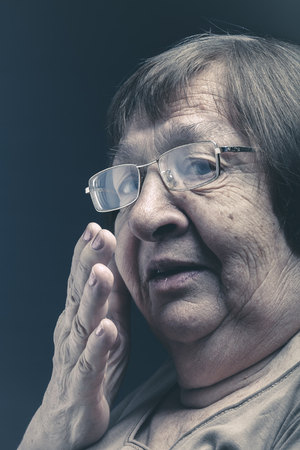 Portrait of elderly woman. Toned.の写真素材