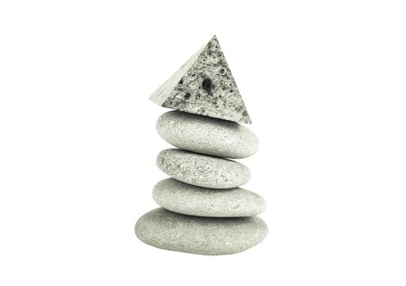 Stack of gray stones on a white background. Toned.の写真素材