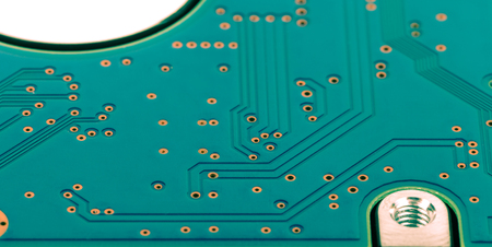 Computer hard disk surface. Selective focus. Shallow depth of field. Toned.の写真素材