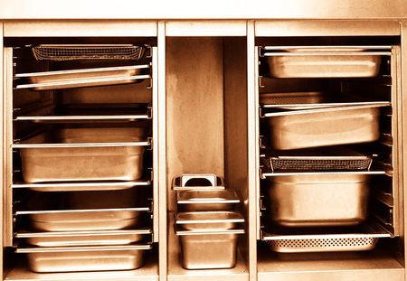 Set of steel kitchen professional dish. Toned.の写真素材