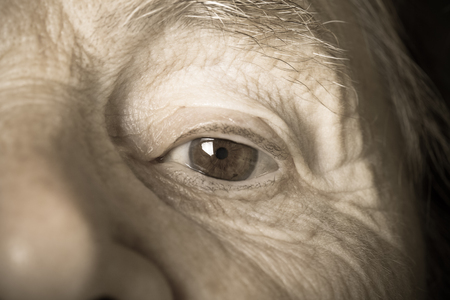 Portrait of elderly woman. Close-up detail. Toned.の写真素材