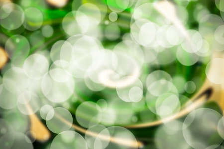 Abstract bokeh festive background with defocused lightsの写真素材