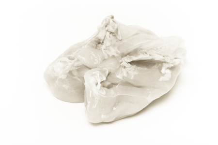 Raw chicken breast on light background. Toned.の写真素材