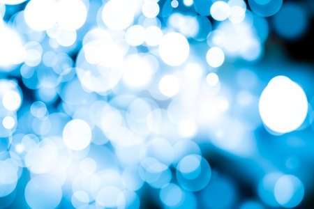 Abstract bokeh festive background with defocused lightsの写真素材