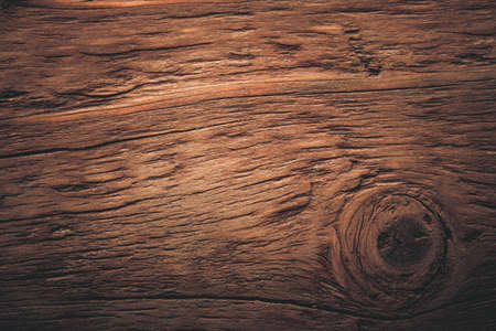 Wooden burned rustic texture for background. Rough weathered wooden board. Toned.の写真素材
