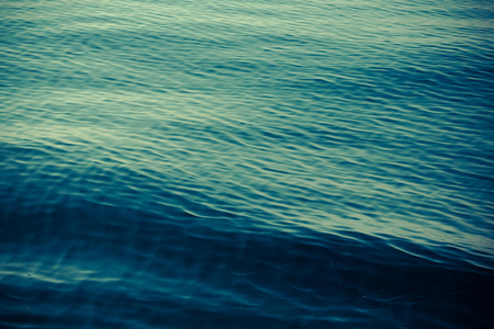 Surface of blue sea water. Toned.