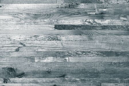 Rough weathered wooden board. Rustic texture for background. Toned.の写真素材
