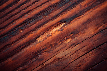 Rough weathered wooden board. Rustic texture for background. Toned.の写真素材