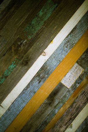 Wooden background from the ends of old boards. Toned.の写真素材