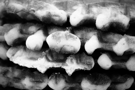 Stack of round waffles close up. Toned.の写真素材