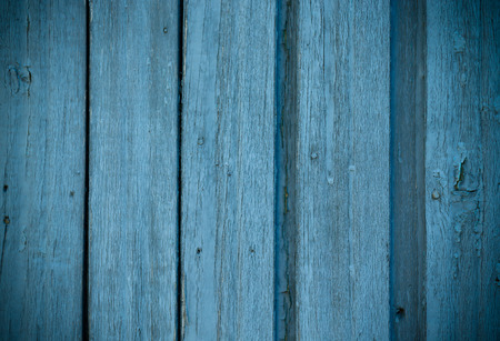 Old wooden planks with peeling paint like background. Toned.の写真素材