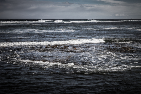 Stormy sea landscape in the Iceland. Toned.の写真素材