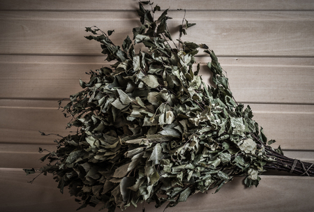 Equipment for sauna in light wooden cozy interior. Toned.の写真素材