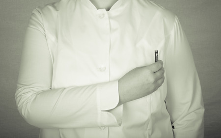 Woman doctor a color background. Selective focus. Toned.の写真素材