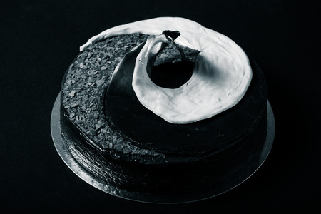 Homemade chocolate cake with spiral decore. Toned.の写真素材
