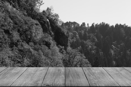 Mountain landscape of the Borjomi in Georgia. View from dark table or board. Collage. Toned.の写真素材