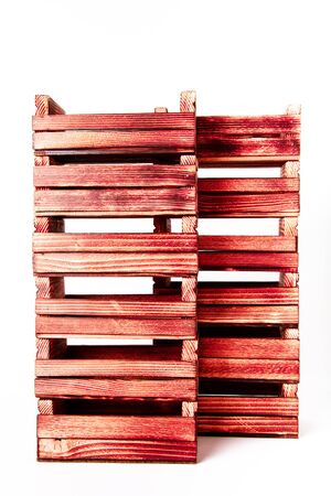 Handmade burned wooden boxes on a light background. Toned.の写真素材