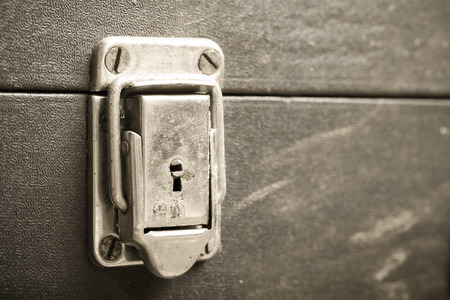Old metal lock on rustic ancient box. Toned.の写真素材