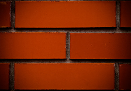 Red brick wall. Wallpaper of ordinary building wall textureの写真素材