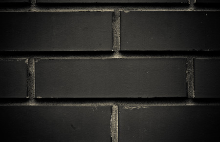 Red brick wall. Wallpaper of ordinary building wall textureの写真素材